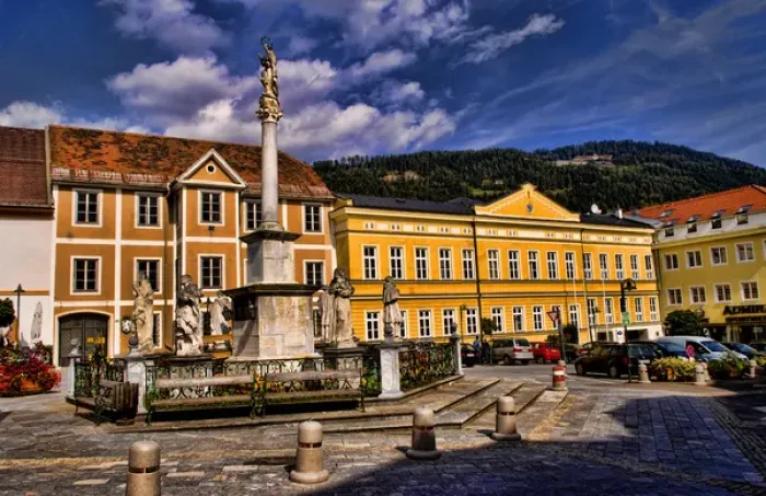 Framed Print : Beautiful main square of Schillerplatz Austria with statue and colorful buildings Framed Print : Beautiful main square of Schillerplatz Austria with statue and colorful buildings