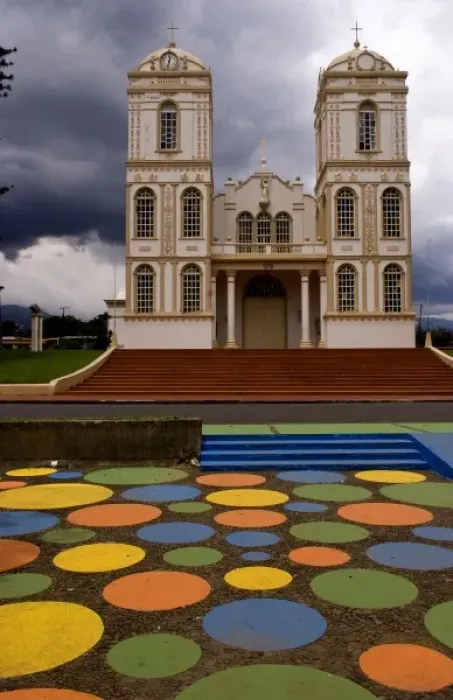 Framed Print : Beautiful old cathedral church and painted dots on pavement in Sarchi Norte in Costa Framed Print : Beautiful old cathedral church and painted dots on pavement in Sarchi Norte in Costa