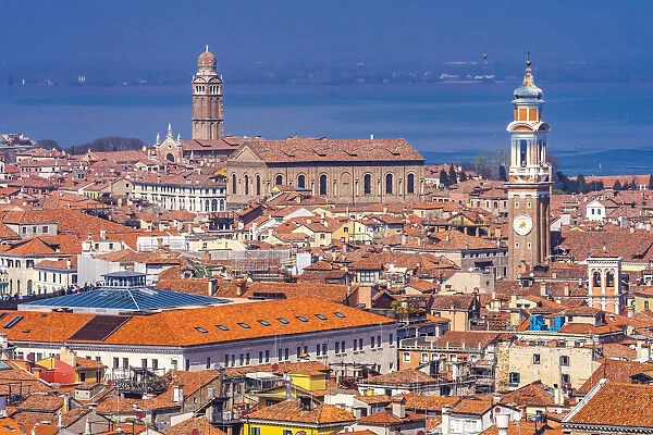 Beautiful orange roofs and neighborhoods, houses and church in Venice, Italy