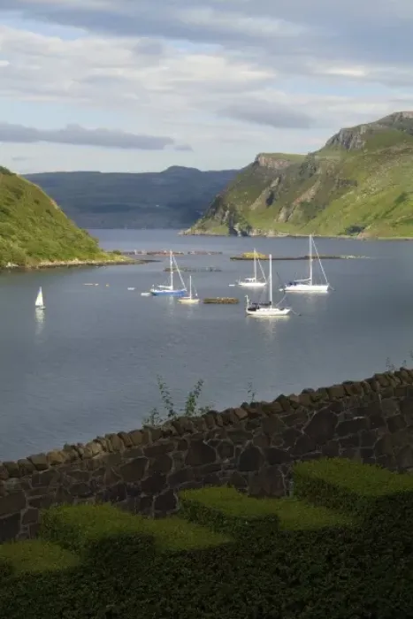 Framed Print : Beautiful port and sailboats with reflections in small tourist village of Portree