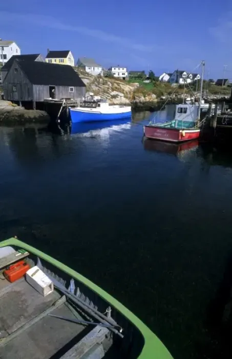 Framed Print : Beautiful village of Peggys Cove with harbor and fishing sheds in Nova Scotia Canada
