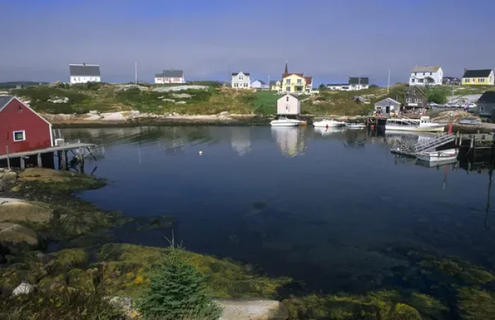 Framed Print : Beautiful village of Peggys Cove with harbour and fishing sheds in Nova Scotia Framed Print : Beautiful village of Peggys Cove with harbour and fishing sheds in Nova Scotia