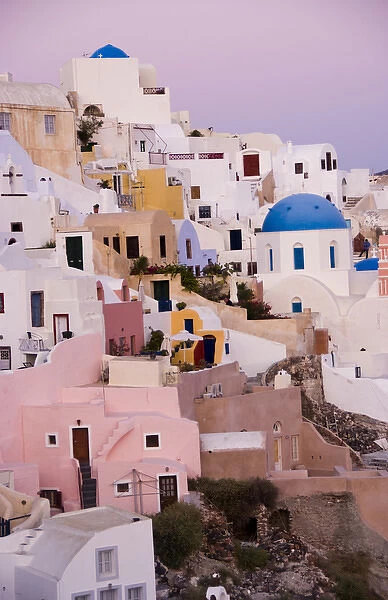 The beautiful white buildings on the cliffs of the small city of Oia, Santorini