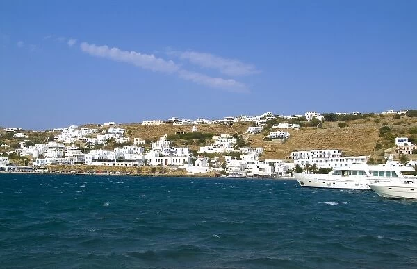 Beautiful white buildings in downtown village of the island of Mykonos Greece
