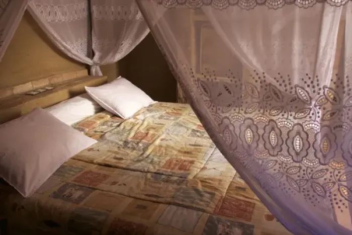 Framed Print : Bed in hotel, Morocco Framed Print : Bed in hotel, Morocco