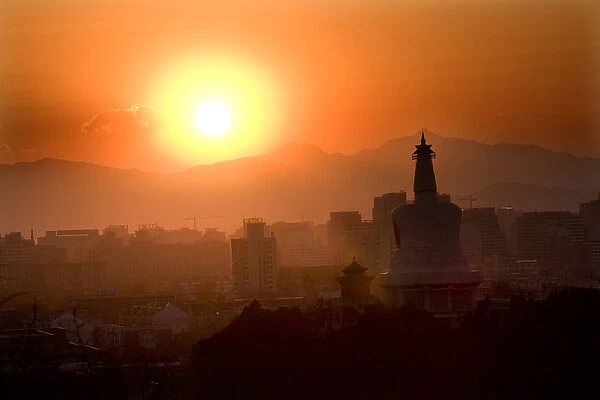 Beihai Stupa with Sunset and Mountains in Background, taken from Jinshang Park, Beijing