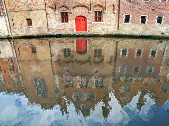 Framed Print : Belgium, Bruges. Reflections of medieval buildings along canal