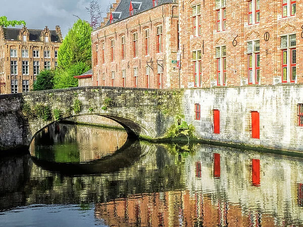 Belgium, Brugge. Reflections of medieval buildings along canal