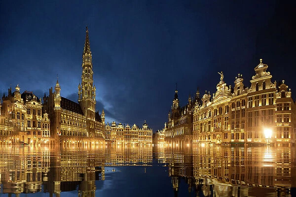 Belgium, Brussels. Grand Place main square lit at twilight