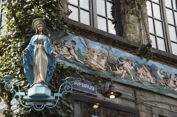 Belgium, Flanders, Antwerp Province, Antwerp, Statue of Madonna on corner of building