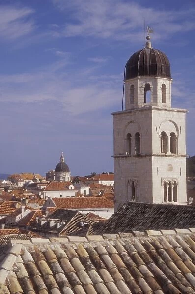 The Belltower and old tiled roof of the Fransciscan Monastery dominate this rooftop