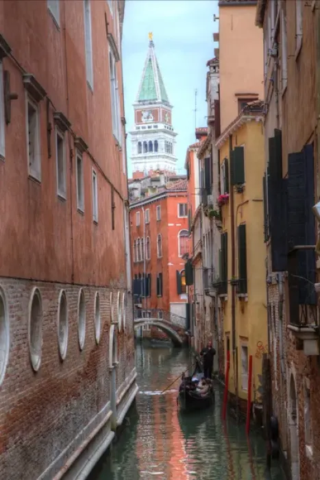 Framed Print : Belltower St. Marks Square seen through narrow canal, Venice Italy