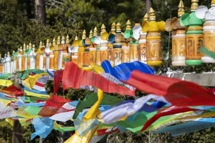 Framed Print : Bhutan, Paro. Colorful prayer wheels and flags along the hiking trail to the Tiger Framed Print : Bhutan, Paro. Colorful prayer wheels and flags along the hiking trail to the Tiger