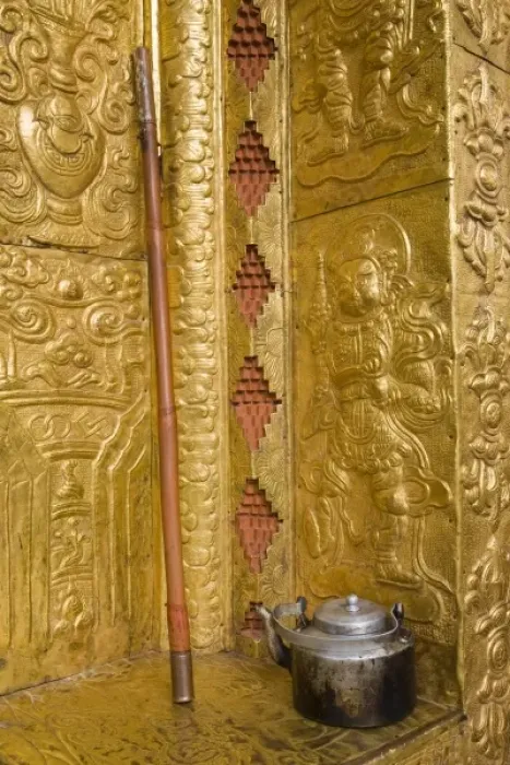 Framed Print : Bhutan, Punakha Dzong. Old tea pot and staff outside the gilded temple walls Framed Print : Bhutan, Punakha Dzong. Old tea pot and staff outside the gilded temple walls