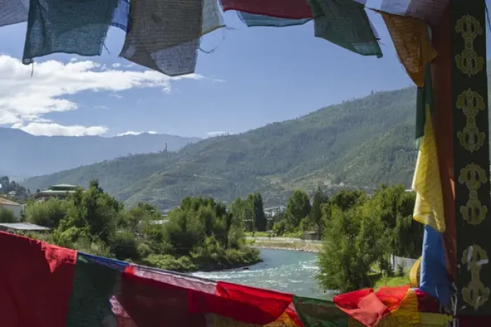 Framed Print : Bhutan, Punakha. Prayer flags line the cantilever bridge over the Mo Cchu river
