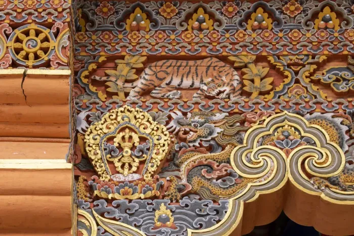 Framed Print : Bhutan. Traditional hand painted and carved wooden architectural detail with tiger Framed Print : Bhutan. Traditional hand painted and carved wooden architectural detail with tiger