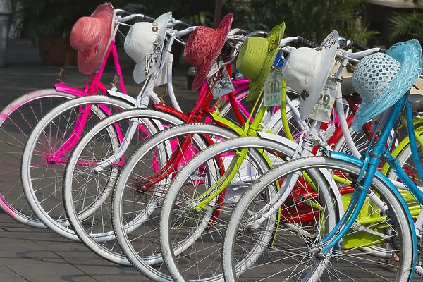 Bicycles and colorful straw hats on the street, Jakarta, Indonesia