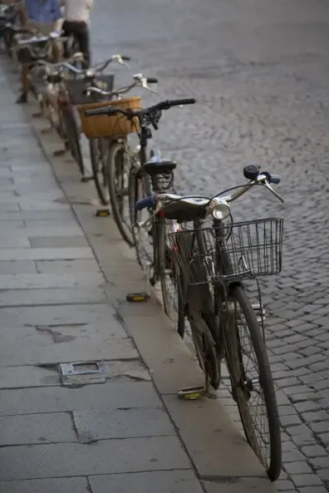 Framed Print : Bicycles parked at curb, Ferrara, Emilia Romagne, Italy Framed Print : Bicycles parked at curb, Ferrara, Emilia Romagne, Italy