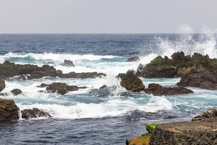 Framed Print : Biscoitos, Terceira Island, Azores, Portugal. Surf crashing on lava rocks