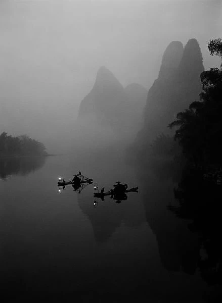 Black and white, China, Li River, Fisherman on Rafts fishing with Cormorants