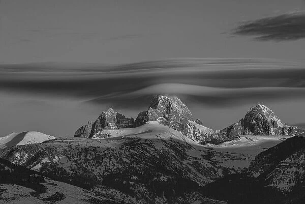 Black and white of Grand Teton, Middle Teton and Mount Owen with cirrus cloud seen