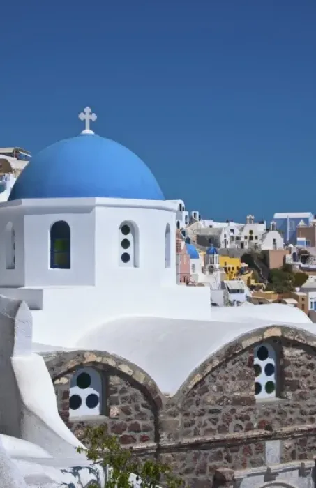 Framed Print : Blue domb church of beautiful Oia in Greek Island of Santorini Greece on cliffs