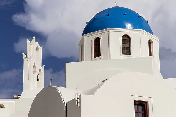 Blue Roofed Churches and homes are everywhere on the Island. Santorini. Greece
