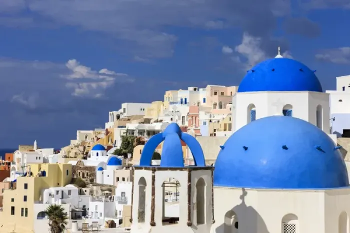 Framed Print : Blue Roofed Churches are everywhere on the Island. Cities embrace the steep Mountain Sides Framed Print : Blue Roofed Churches are everywhere on the Island. Cities embrace the steep Mountain Sides