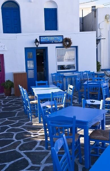 Blue tables and chairs at a restaurant on the Cyclades Islands, Paros
