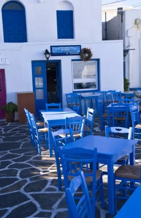 Framed Print : Blue tables and chairs at a restaurant on the Cyclades Islands, Paros Framed Print : Blue tables and chairs at a restaurant on the Cyclades Islands, Paros