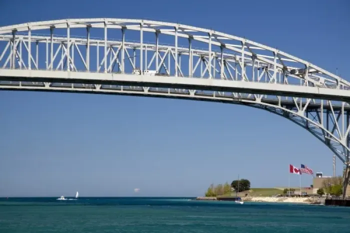Framed Print : The Blue Water Bridge is a twin-span bridge that spans the St. Clair River between Port Huron Framed Print : The Blue Water Bridge is a twin-span bridge that spans the St. Clair River between Port Huron