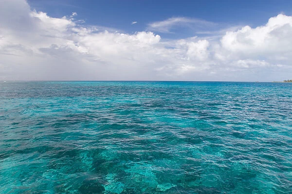 The blue waters of the Caribbean Sea over a coral reef near the island of Antigua