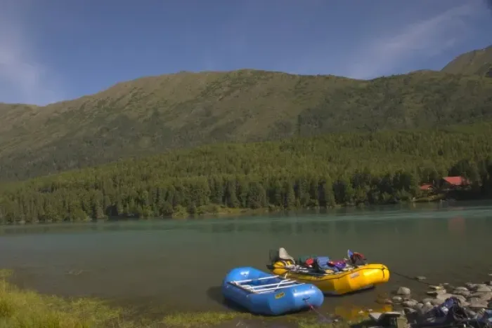 Framed Print : A blue and a yellow rubber raft on the Kenai River along the Sterling Highway in Alaska
