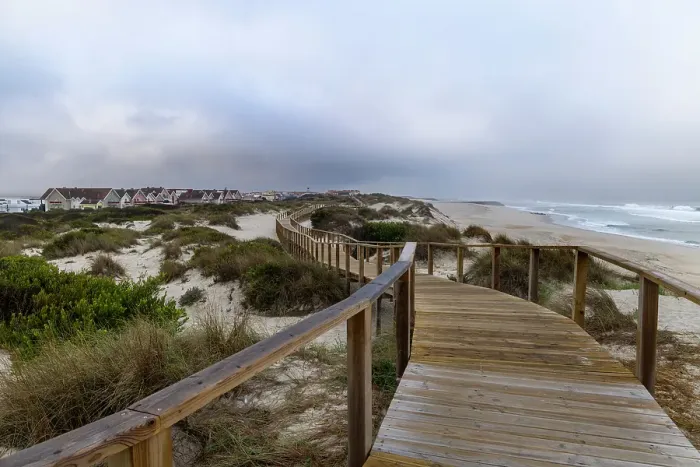 Framed Print : Boardwalk along the sand dunes at Cost Nova, Portugal