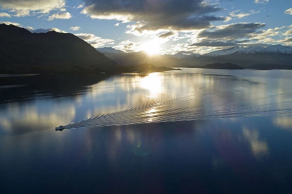 Boat crossing Lake Wanaka, Otago, South Island, New Zealand
