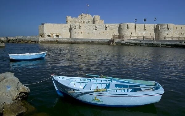 Boat and Fort Qu it Bey along the Mediterranean Alexandria, Egypt