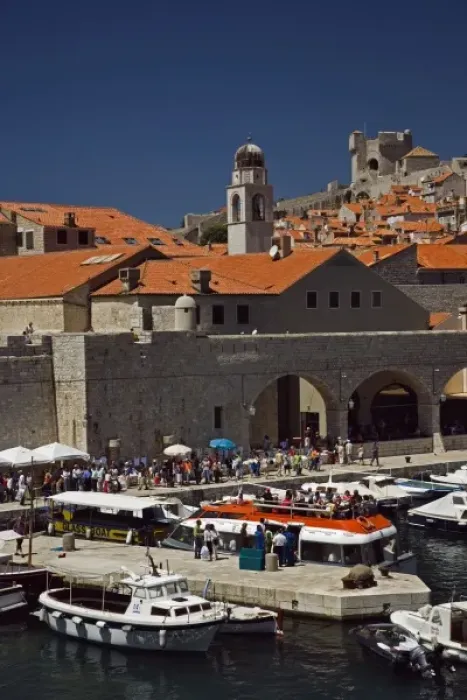 Framed Print : Boats docked in harbor at Old Town Dubrovnik a UNESCO World Heritage Site, Croatia