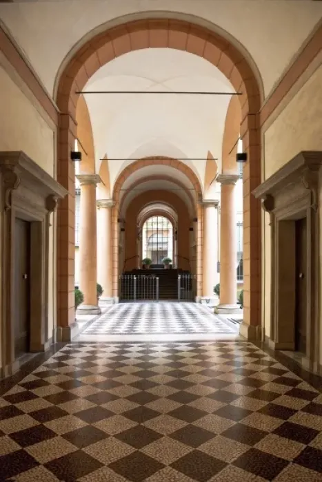 Framed Print : Bologna, Emilia-Romagna, Italy - An arched hallway with a diamond patterned floor Framed Print : Bologna, Emilia-Romagna, Italy - An arched hallway with a diamond patterned floor