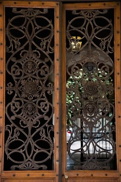 Bologna, Emilia-Romagna, Italy - A gage can be seen behind double wooden doors with
