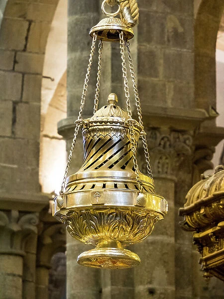 The Botafumeiro, famous silver thurible, that hangs in the central nave of the cathedral in Santiago de Compostela, Spain