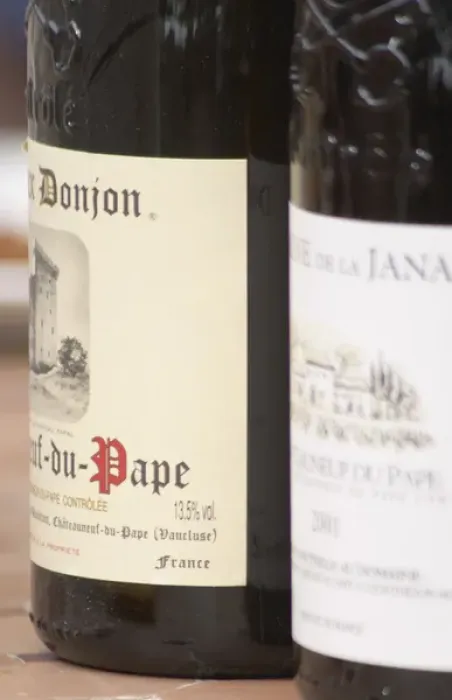 Framed Print : Bottle of Domaine Donjon. The restaurant Le Verger de Papes in the village Framed Print : Bottle of Domaine Donjon. The restaurant Le Verger de Papes in the village