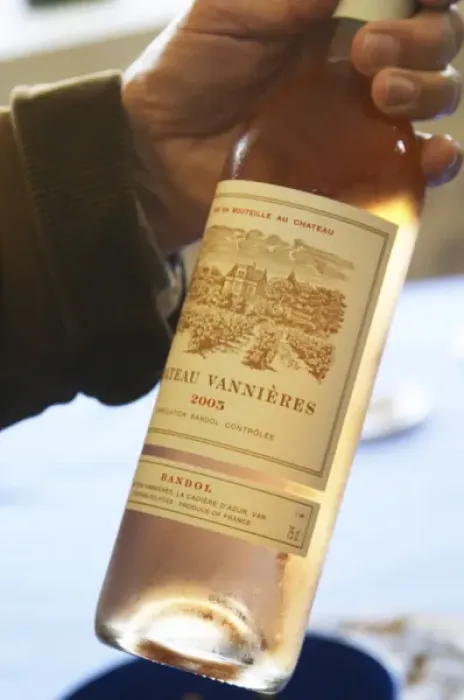 Framed Print : Bottle of rose wine 2005 in a hand Chateau Vannieres (Vannieres) La Cadiere (Cadiere)
