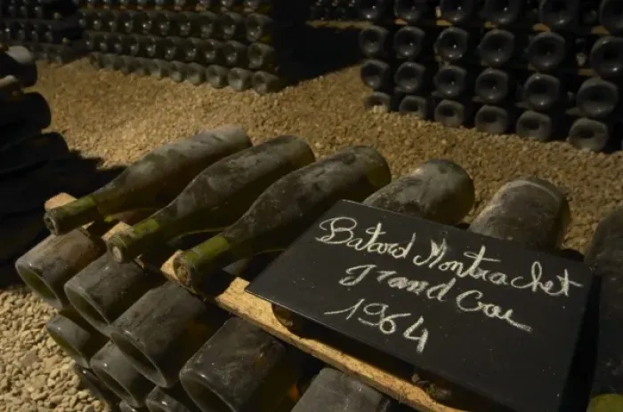 Framed Print : Bottles of Batard Montrachet Grand Cru 1964 Burgundy wine with the appellation written