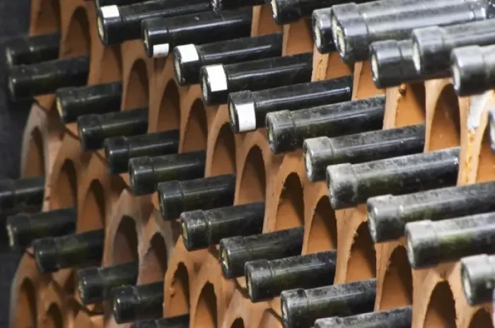 Framed Print : Bottles laying down piled high in terracotta earthenware tube containers. VitaI Vitaai Framed Print : Bottles laying down piled high in terracotta earthenware tube containers. VitaI Vitaai