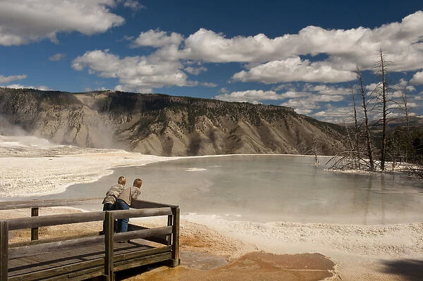 Two boys admiring Canary Springs, Mammoth Terrace, Yellowstone National Park, Gardner