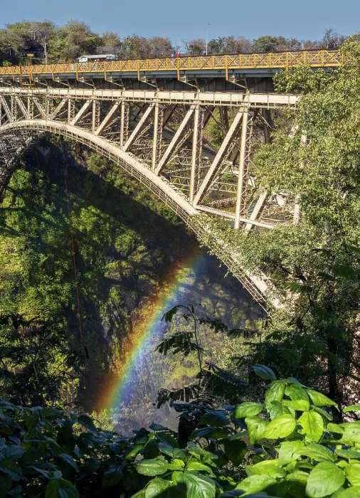Framed Print : Bridge over the Zambesi River with rainbow. Bordering Zambia and Zimbabwe. Zambezi National Park. Zimbabwe