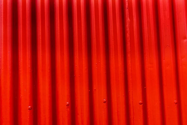 Bright red orange Corrugated Lead, Metal abstract Patterns Background, Reykjavik, Iceland