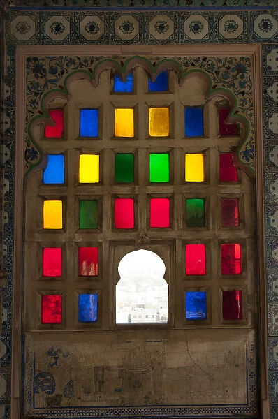Brightly colored glass window, City Palace, Udaipur, Rajasthan, India