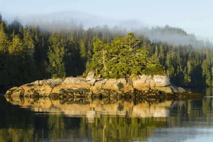 Framed Print : British Columbia. Rocky islands reflect in the water of Canadas inside passage Framed Print : British Columbia. Rocky islands reflect in the water of Canadas inside passage