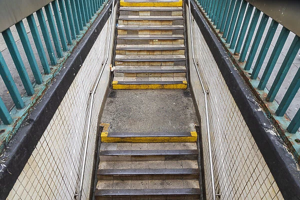 The Bronx, New York, USA. Stairs descending to the subway